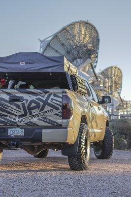 Our custom built Shop Tundra with icon suspension and overland rack, arb tent.