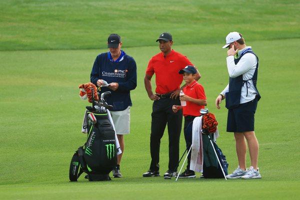 Tiger Woods and son, Charlie Woods. This event was Charlie's network TV debut.