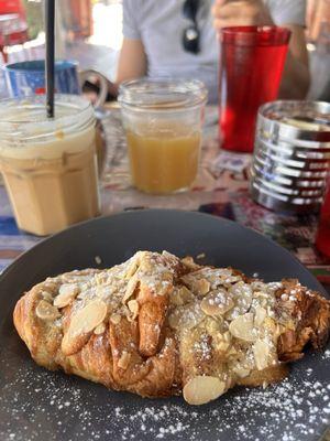 Almond croissant, iced latte and pineapple juice