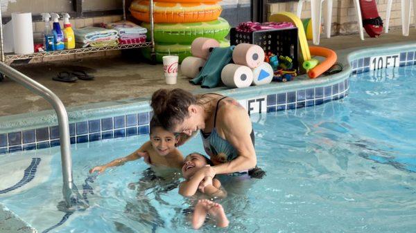 Coach Emily and my middle two swimmers (5 & 3)