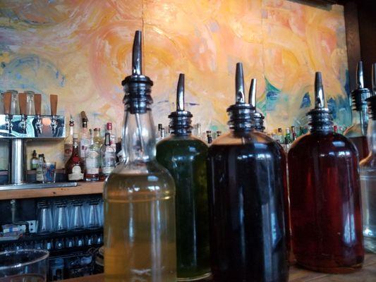 Syrups at thr top of the bar...