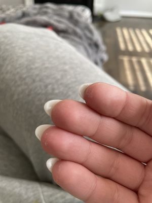 Dip powder and top coat stuck on underside of nails