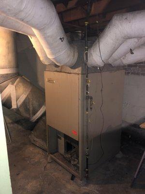 Old standing pilot gas furnace.