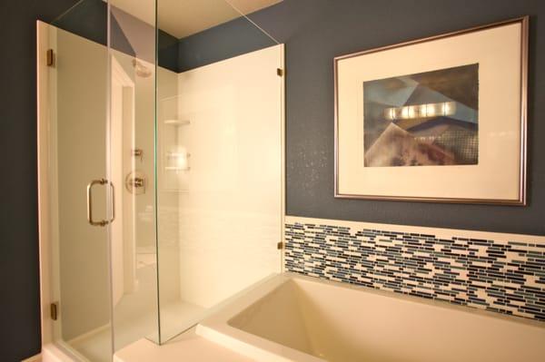 White Kerrock shower and tub surround