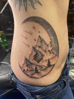 Black and grey moon and mountain tattoo