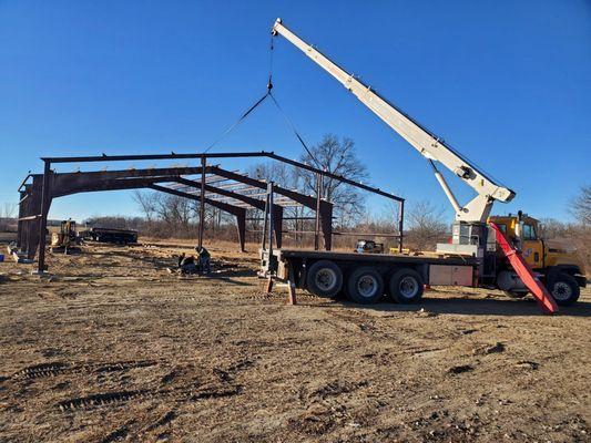 Great fall day to erect this prefabed building