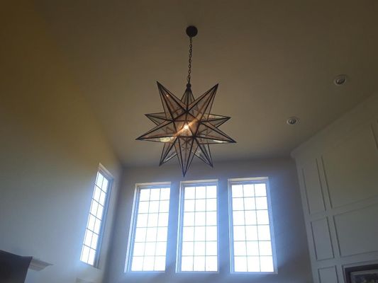 Installed This Light Fixture.  20' tall ceilings and about 40lbs. No matter the height and weight we can install it.