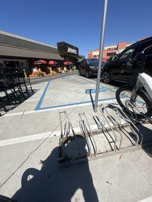 Awful, insecure and rusting/broken bike rack.