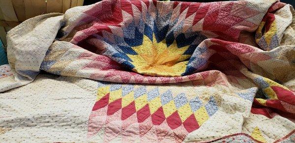 Vintage quilt restoration. Beautiful quilt called "Star of the East."