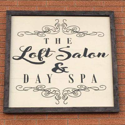 This is the logo and sign for the salon.