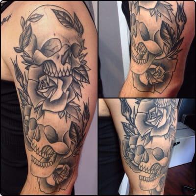 Healed custom skull and rose sleeve!