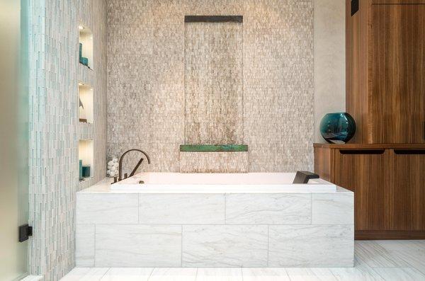 This Tiburon bathroom is a beautiful example of how many of our stone and glass options can be combined together.