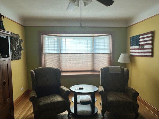 Surround yourself with comfort and character.  Our trilight shades set the perfect tone in this cozy corner, blending ...