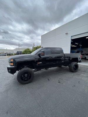 This Silverado had the entire front end, doors and bedsides wrapped in gloss paint protection film (clear bra)