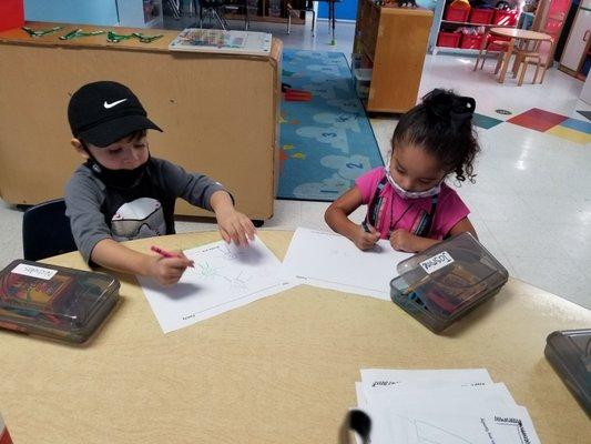 Children working on family photo