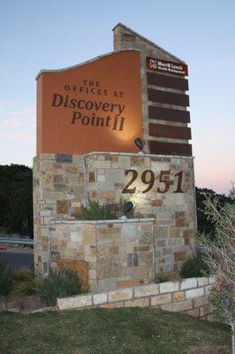 Stucco and Stone monument with metal lettering and metal tenant panels