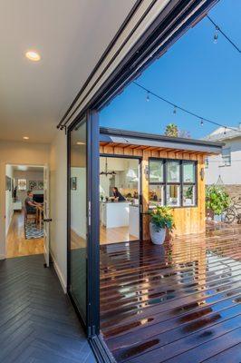 Custom sliding glass doors for a strong indoor-outdoor connection.