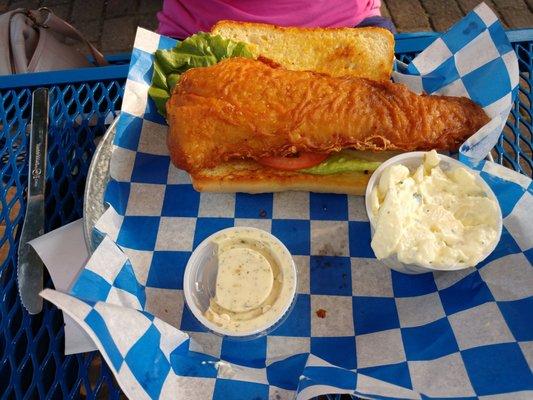 Colossal Fish sandwich and potato salad Minocqua Lakeside Grill Lake Tomahawk WI