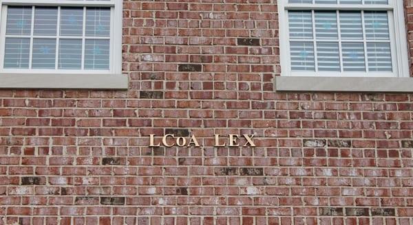 discrete name on building