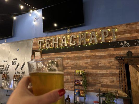 Beer and indoor sign.