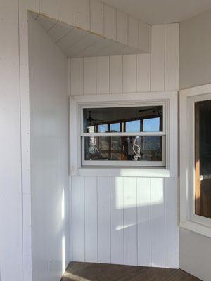 Shiplap wall with window casing