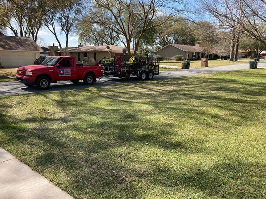 American Grounds Service lawn care setup.