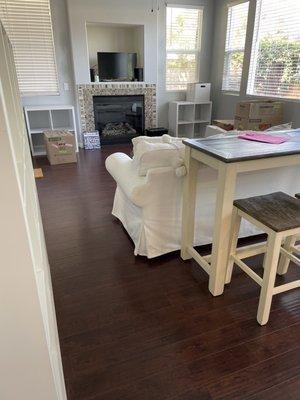 Loved the gas fireplace & light through the windows. So bright and airy! Not quite all unpacked.