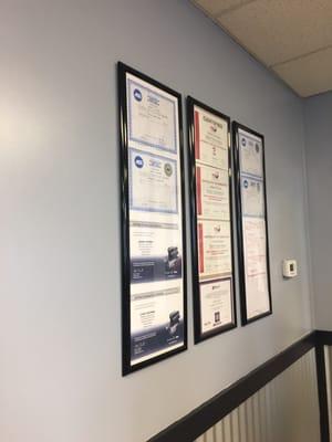 ASE certifications and TIA certifications on wall.