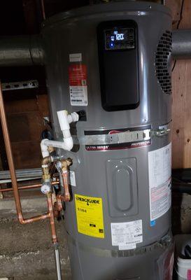 Water heater, fully installed by Awesome Plumbing, in my garage.