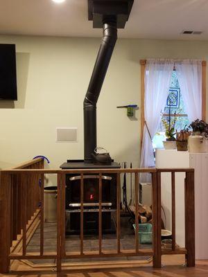 Wood burning stove install and custom child safety barrier.