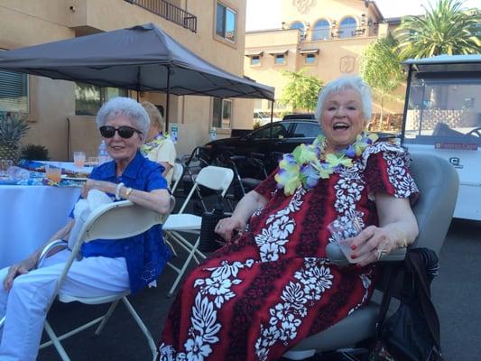 Residents enjoying luau at the Pointe at Lantern Crest