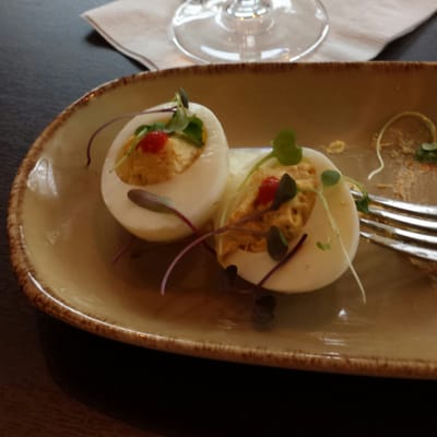 Deviled eggs with crab and siracha