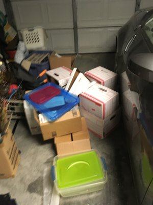 This is one picture of the many boxes that I emptied where they had just put junk