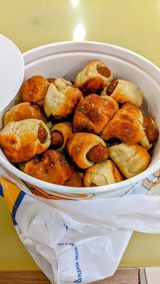 A bucket of pretzel dog bites