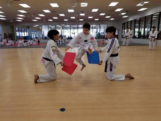 Breaking practice with members of the Yong-In Demonstration Team at our Mason school.