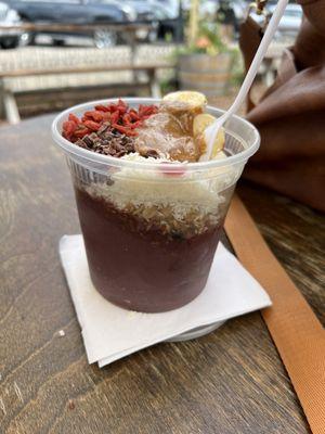 Açaí bowl with almond butter, cacao, bananas, coconut and goji berries. I ate this and was not hungry again until dinner.