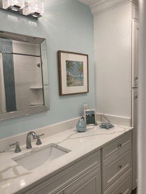 Beautiful quartz countertop on larger vanity.