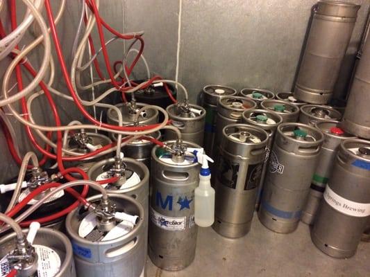 Kegs of craft beer in the walk-in cooler.