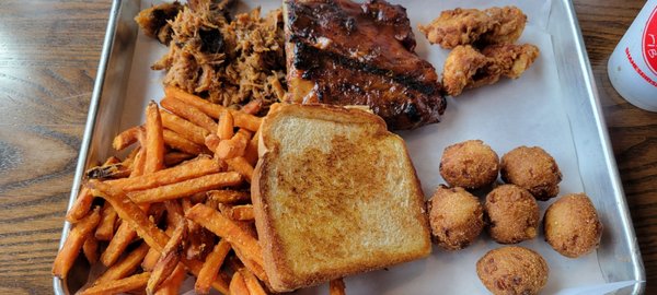 Shanes sampler ribs, Chicken tenders, pulled chicken with 2 sides.