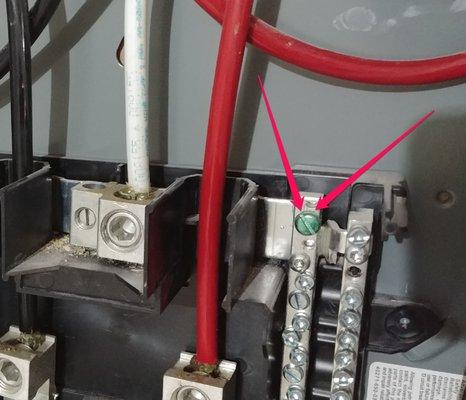 Danger! This screw should be removed from electrical subpanel.