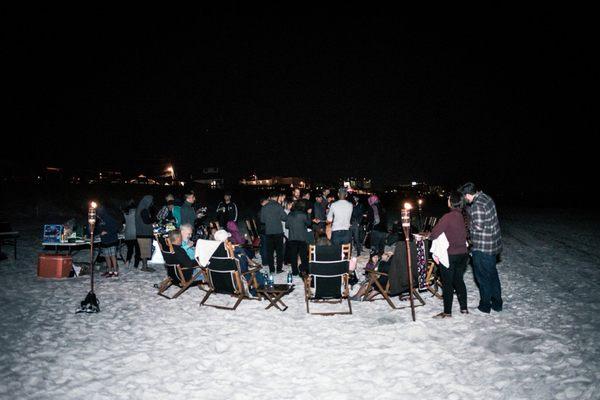 A wedding rehearsal to remember! What better way for families to come together than a bonfire on the beach? We're drawing a blank.