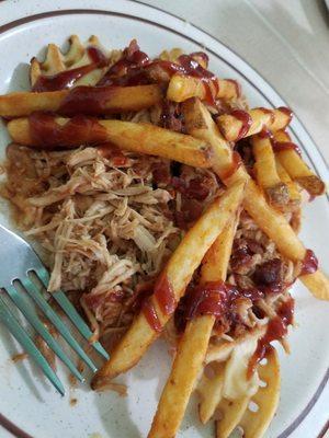 Shredded chicken horseshoe special of the day! Waffle fries layered with cheese sauce shredded chicken seasoned fries and barbecue sauce.