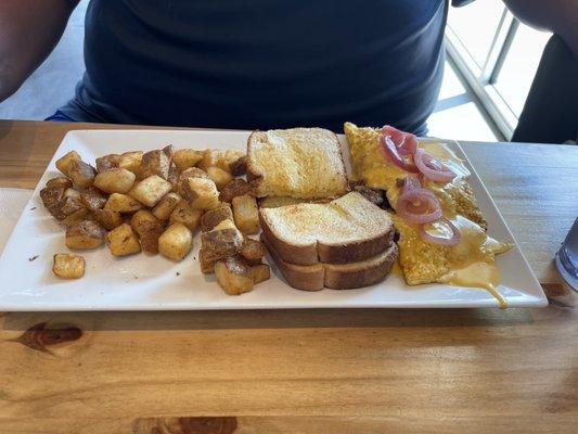 Pork belly omelette, breakfast potatoes, and white toast.