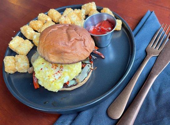 Veggie breakfast sandwich and herbed tater tots