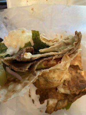 One thin, paltry slice of gyro meat in the wrap is all you get.