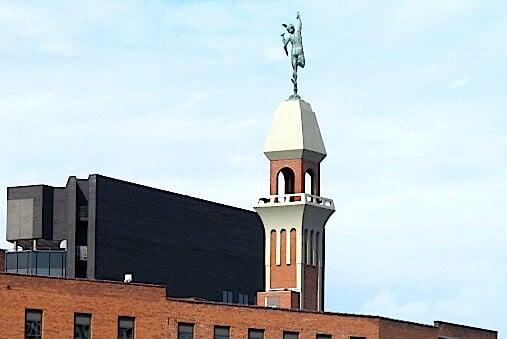 copper Mercury messenger statue on top of Aquaduct Building