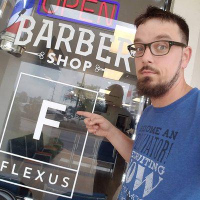 Just me posing with my new haircut in front of the shop.