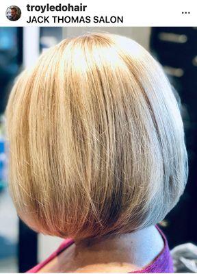 Classic Bob haircut with multidimensional blonde highlights