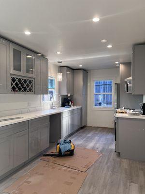 My new kitchen Cabinets from Ideal Home Decor Center in Pittsburgh. Custom made wine rack and beautiful grey. Love it.