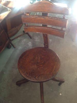 Vintage wood desk chair.   Was actually comfortable.